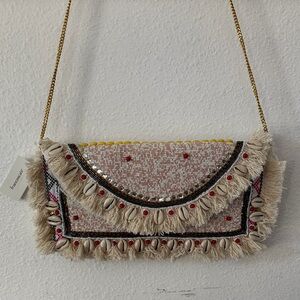 Francesca's Collections Beige and Red Fringed Clutch